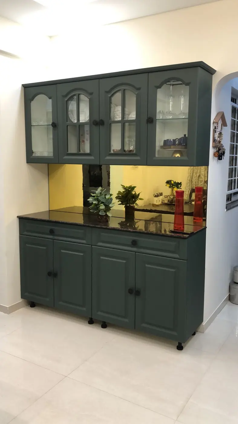Green PU crockery unit with arched glass doors and gold mirror backsplash, Pune