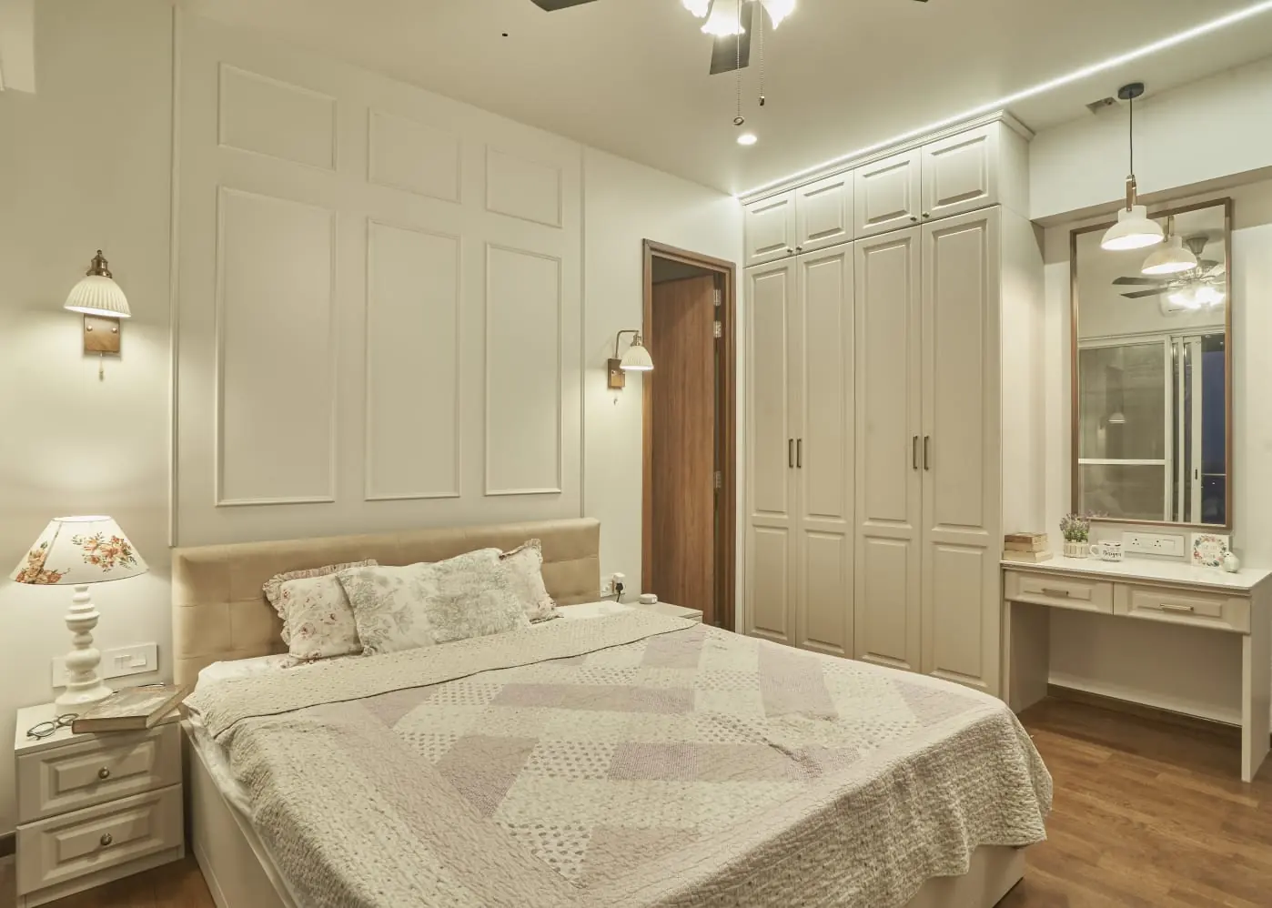 White modular wardrobe with dresser in a master bedroom, Pune